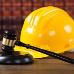 Personal Liability of Officers and Directors Under Ontario’s Construction Legislation - Yellow hard hat and judge gavel