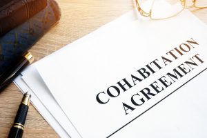 Do I Need A Cohabitation Agreement?- document with a the words Cohabitation Agreement + a pen