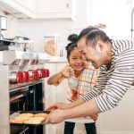 Tips for Separated Parents During the Holiday Season | Dad and son baking cookies