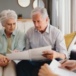 An older couple looking at their Will