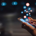 Young woman using smart phone,Social media concept.